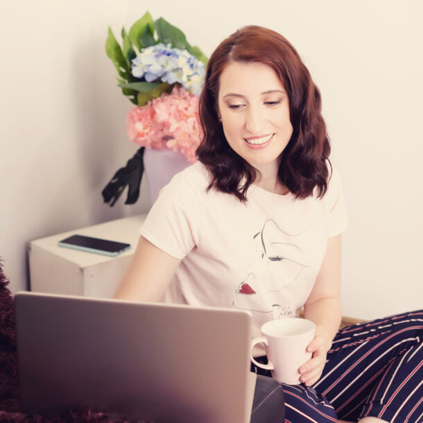 female sitting at a laptop